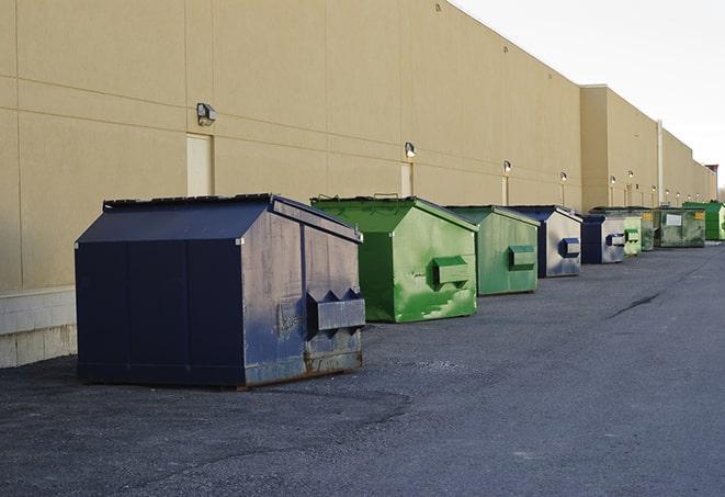 a row of construction dumpsters parked on a jobsite in Descanso